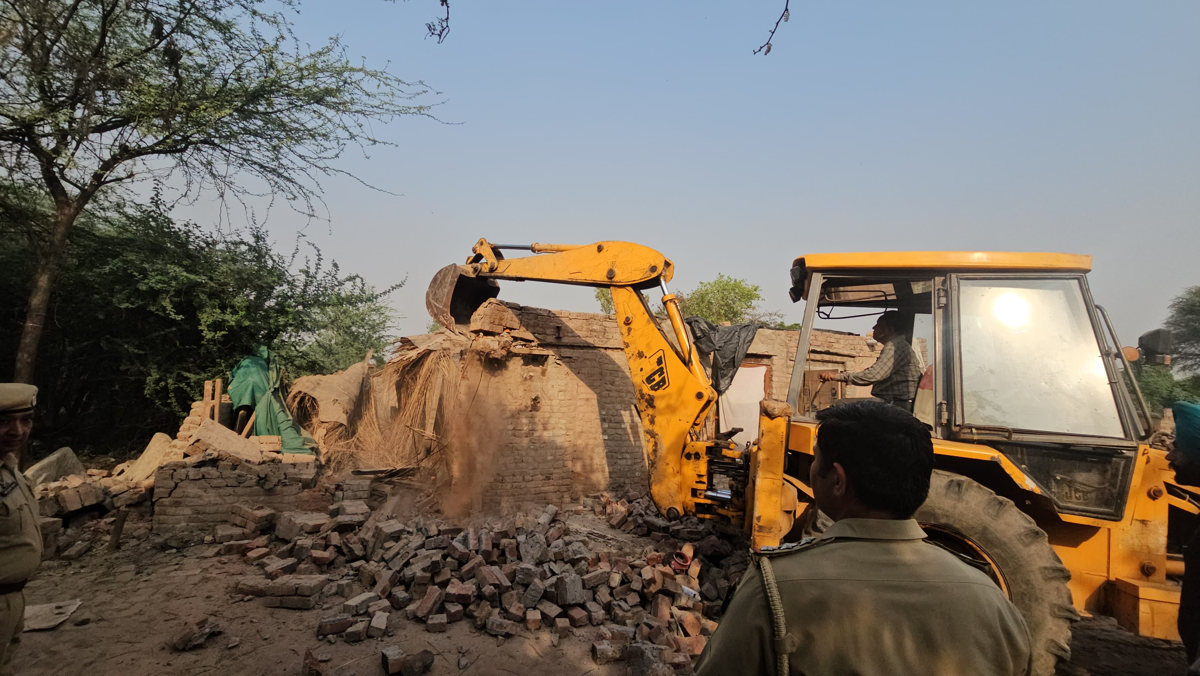 War on Drugs: Drug smuggler’s illegal encroachment on panchayat land demolished in Amala village of Derabassi